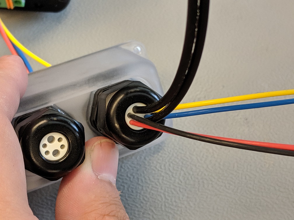 feed fiber thru cord grip